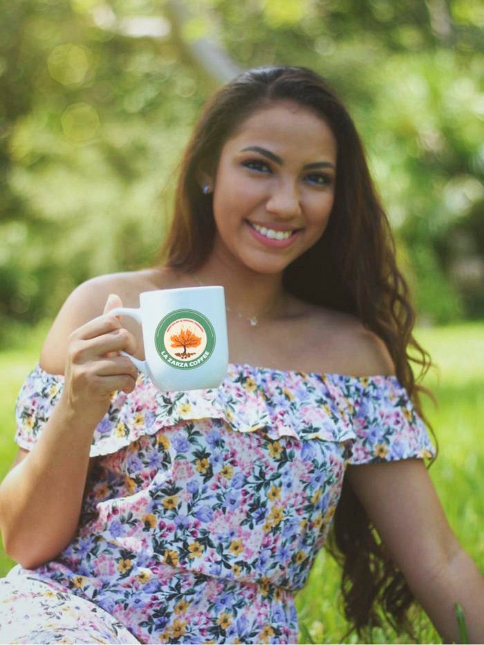 A woman enjoy La Zarza Coffee in the morning